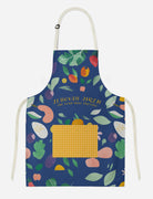 Jehovah Jireh apron featuring vibrant fruit and leaf illustrations with the uplifting message "The Lord Will Provide," embodying faith, encouragement, and simple happiness.