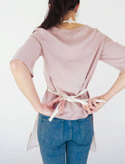 Jehovah Jireh Christian apron product view with adjustable straps and front pocket.