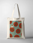 Jesus and Tomatoes CollabPlus+ tote bag with a colourful illustration of Jesus sitting among oversized tomatoes, designed by @nartellac