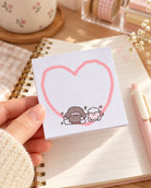 Jesus Is Always with Me heart shaped design sticky notes held above an open notebook