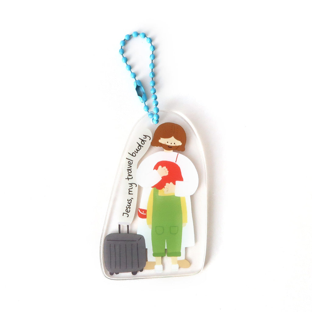 Jesus 'My Travel Buddy' keychain featuring a faith-based design with a child, suitcase, and inspirational Christian theme, perfect as a travel accessory or gift.