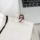 Clear Christian acrylic bookmark featuring Jesus with a sheep and the message “God loves us not because of what we do but because we are His children”