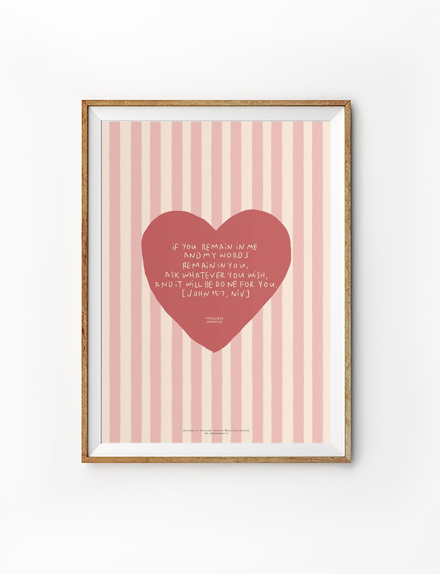 Christian wall art poster featuring a heart illustration with John 15:7 Bible verse on a pink striped background, designed by Moojigae Drawing in collaboration with The Commandment Co.