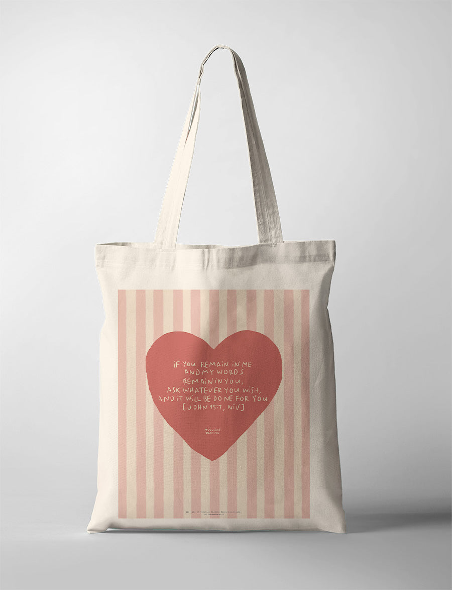 Christian canvas tote bag featuring John 15:7 Bible verse in a heart illustration, created in collaboration with Moojigae Drawing, faith-based tote bag with pink striped design