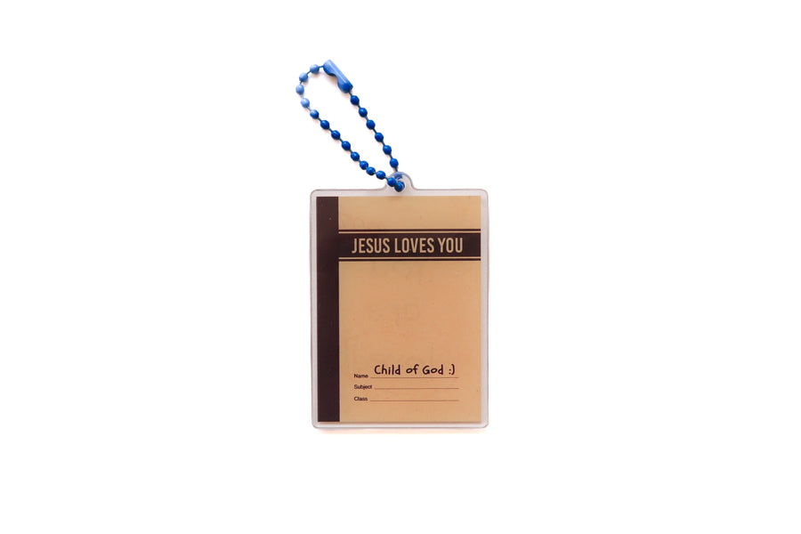 Front view of Jotter Book Jesus Loves You acrylic keychain with Child of God detail and blue ball chain