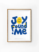 Joy Found Me Christian poster with bold blue lettering, yellow smiley face and playful typography