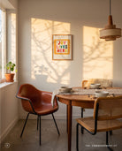 Joy Lives Here colourful poster displayed in a sunlit dining room