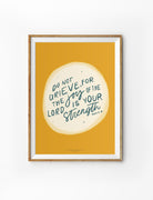 Christian poster featuring Nehemiah 8:10, “The joy of the Lord is your strength” on a mustard yellow background