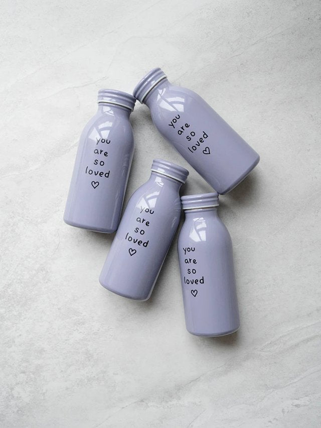 Lavender Milk Bottle Tumbler with “you are so loved” text and heart, a faith-inspired gift by The Commandment Co