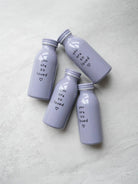 Lavender Milk Bottle Tumbler with “you are so loved” text and heart, a faith-inspired gift by The Commandment Co