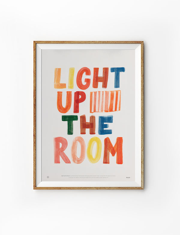 Light Up The Room Christian poster with colourful hand-drawn lettering displayed in a wooden frame on a white background
