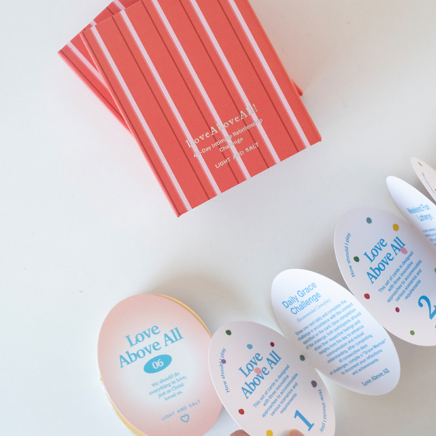Love Above All card game box with striped red packaging, designed for faith-based couples and meaningful relationship conversations.