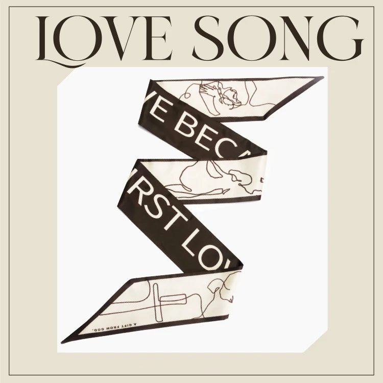 Love Song Christian-inspired faux-silk scarf styled for women.