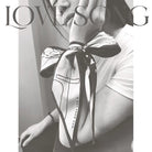Love Song Christian-inspired faux-silk scarf presented as a gift.
