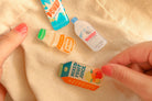 LOVE SUPERMARKET Christian acrylic pin lifestyle image featuring playful hand-drawn designs.