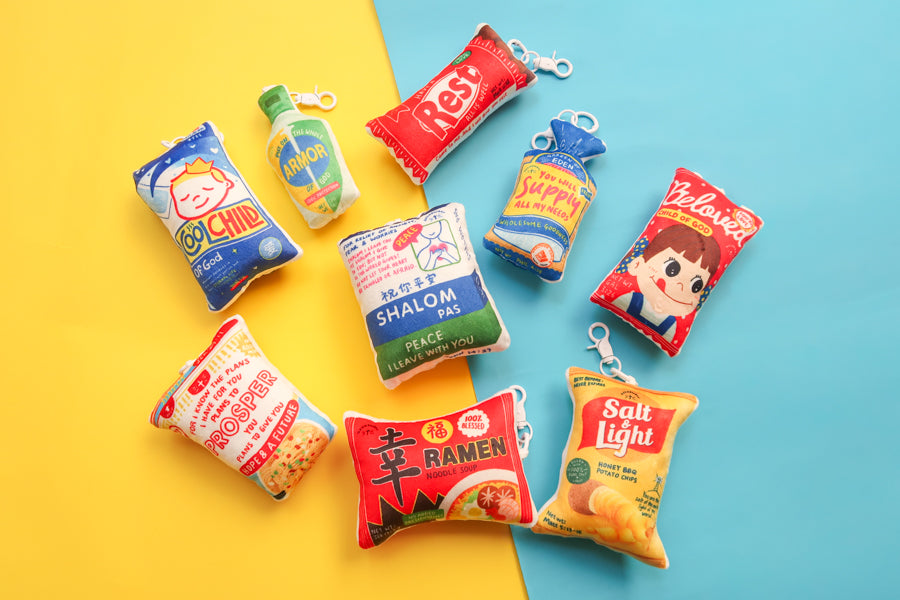Love Supermarket plushie keychain collection featuring Blessed Ramen and other snack-inspired designs