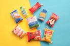 Love Supermarket plushie keychain collection featuring Blessed Ramen and other snack-inspired designs