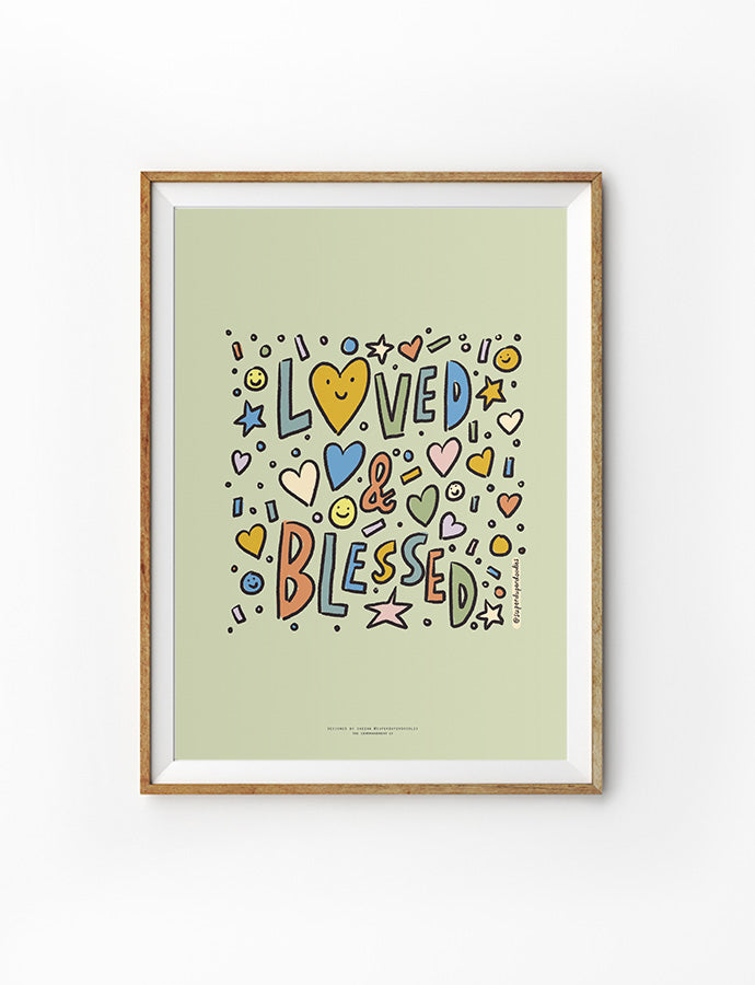 Colorful framed wall art with 'Loved & Blessed' text and playful heart and star designs