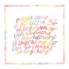 Inspirational greeting card featuring the quote “Magic lives in the little things, wonder can be found in the ordinary, and kindness can be brought to anything” in soft pastel lettering, square 15x15cm card with blank inside and sheer white envelope.