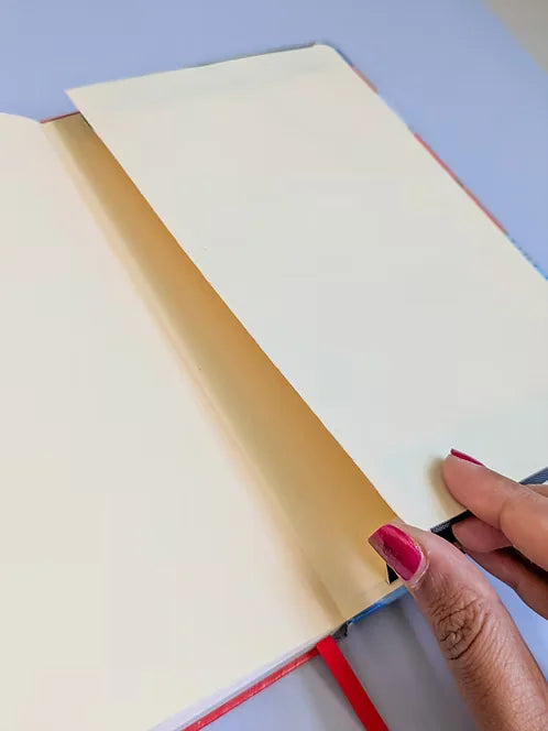 Open Miracles of Jesus journal showing smooth ivory dotted pages and ribbon marker