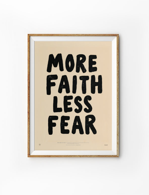 Framed More Faith Less Fear Christian poster with bold black lettering on a warm cream background