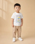 Child wearing a white My Daily Checklist Christian kids T-shirt