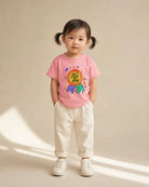Child wearing a pink No.1 Child of God Christian kids T-shirt