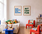 Not Today Fear Christian poster displayed beside New Mercies wall art in a bright colourful living room