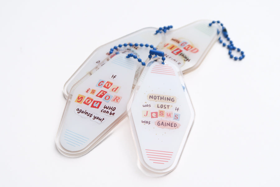 Christian acrylic keychain set with encouraging faith messages, including “Nothing was lost if Jesus was gained,” from the Void to Light collaboration.