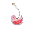 Pink bird-shaped Christmas bauble with decorative patterns and the word ‘Peace’.