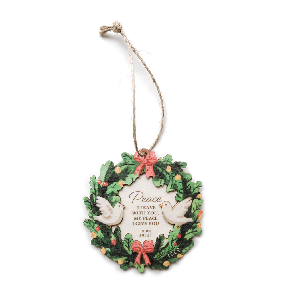 Christian Christmas ornament featuring a festive wreath with two doves, adorned with ribbons and holly, displaying the verse 'Peace I leave with you, my peace I give you' from John 14:27, perfect for holiday decorations or gifting.