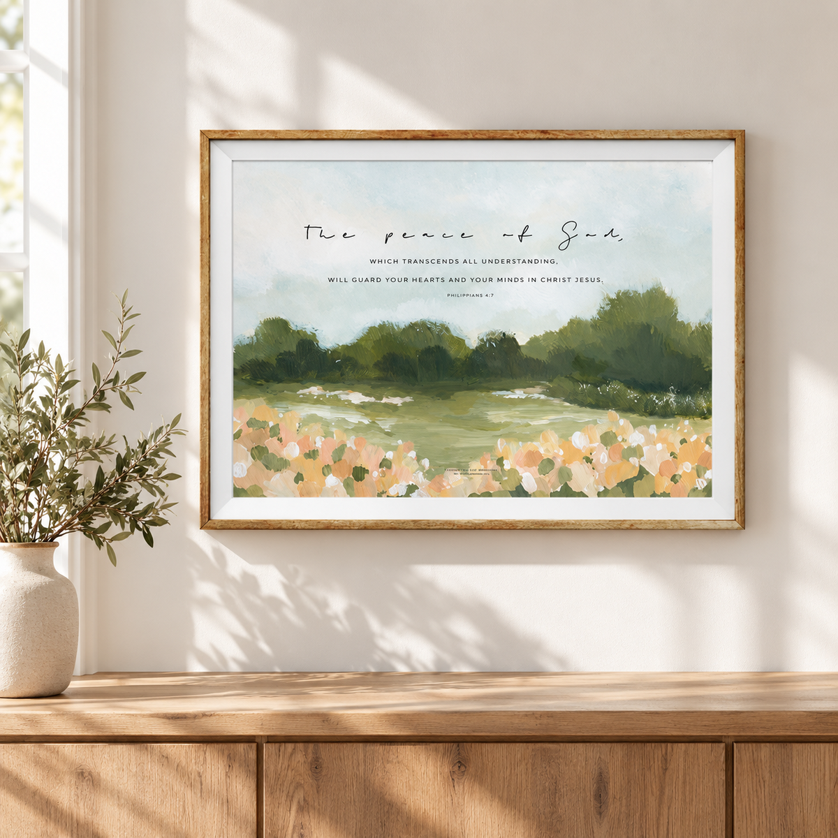 Peace of God Christian poster by Made Seen displayed in a light wood frame above a wooden console.