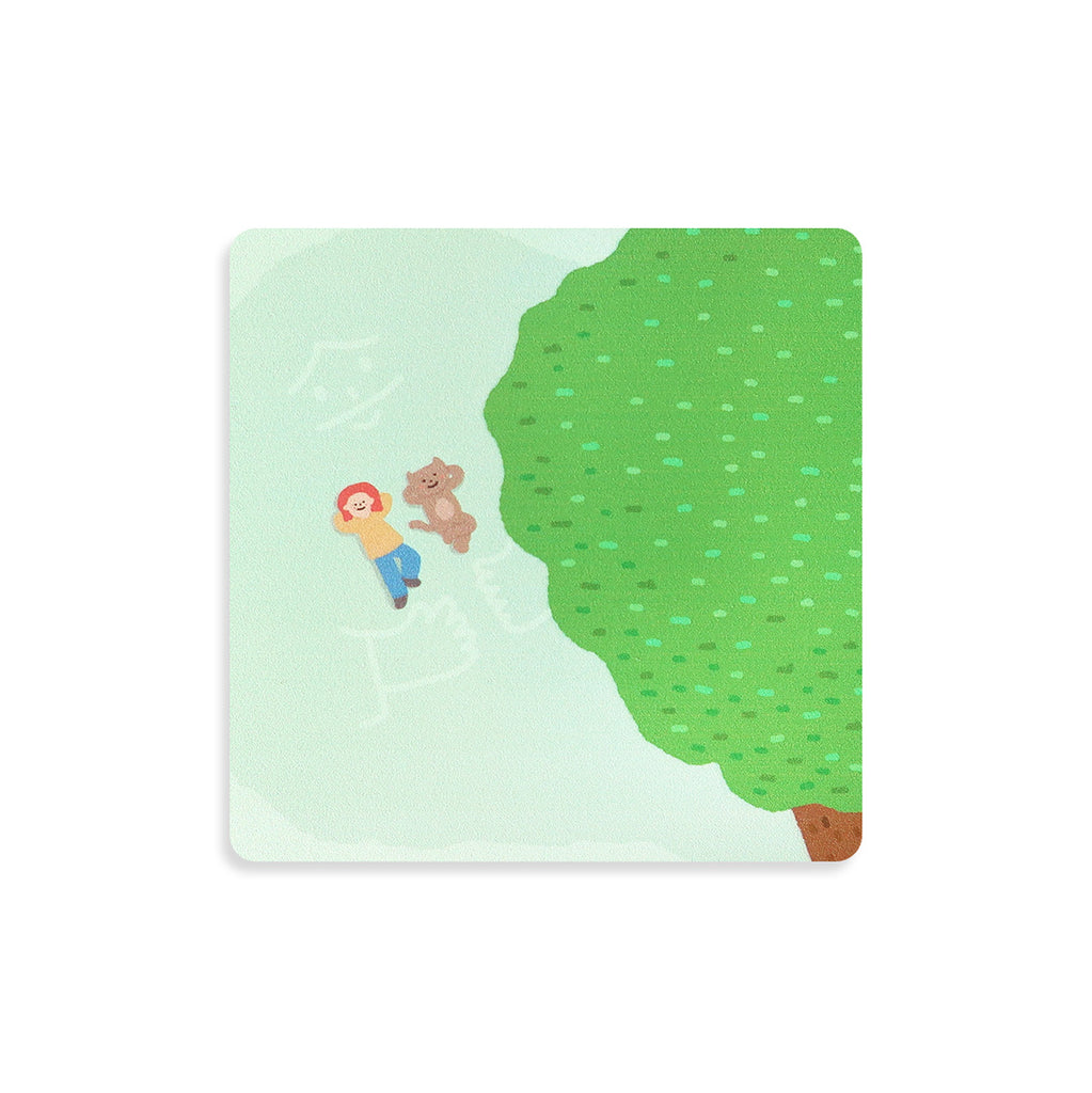 Illustrated coaster showing a child and a dog joyfully lying under a tree, capturing a safe and relaxing moment