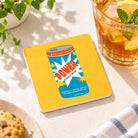 Power Energy Drink Christian coaster styled beside a chilled drink in warm natural sunlight