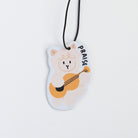 Praise the Lamb Christian car and room scent tag with sheep-and-guitar illustration.