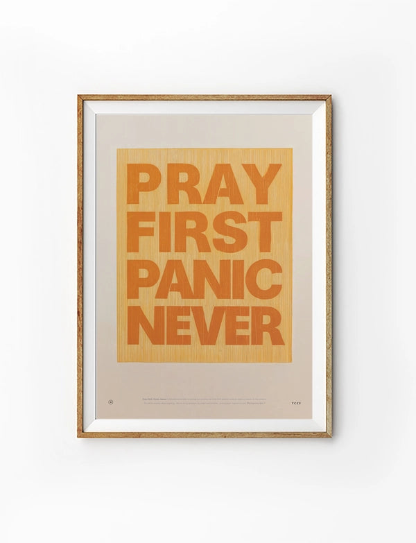 Pray First Panic Never Christian poster with bold orange typography on a warm cream background