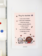 Faith-inspired "Pray for the Child" wall hanging with prayer list and cartoon Jesus and sheep