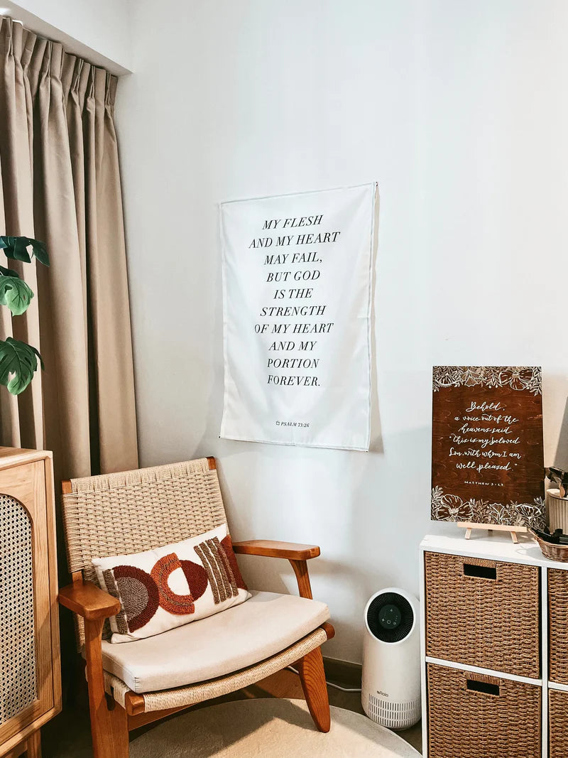  Project J wall tapestry with Psalm 73:26 scripture hanging in a cozy reading nook, creating an uplifting and faith-inspired space for simple happiness and reflection.