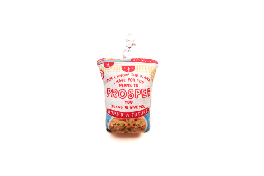 Prosper Noodle plushie keychain with cup noodle-inspired design and Jeremiah 29:11 hope and future reminder.