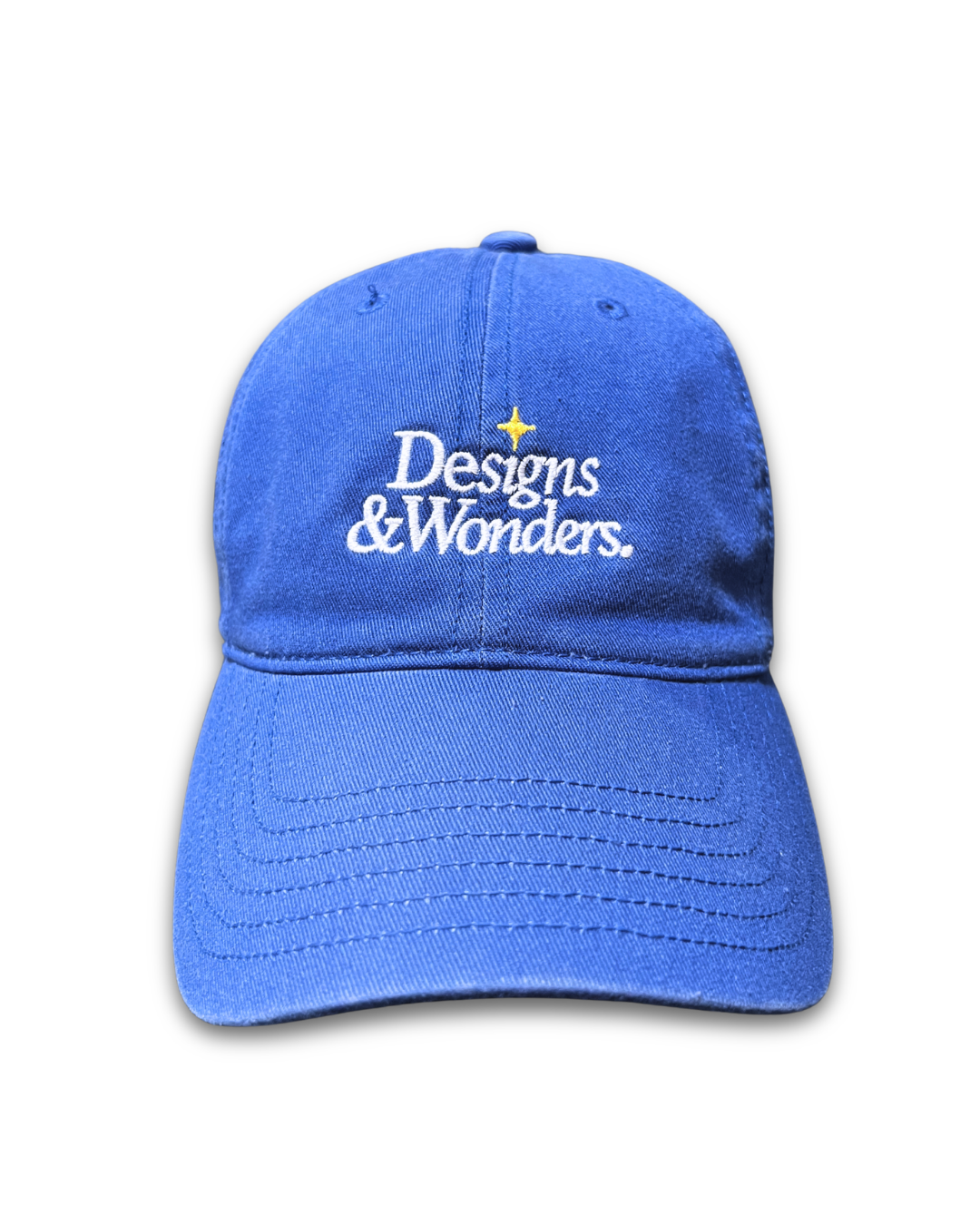 Designs & Wonders embroidered blue cap by Quite at Home with yellow sparkle detail