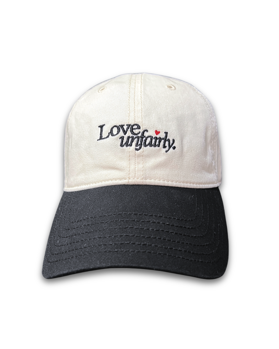 Love Unfairly embroidered cap by Quite at Home in cream and black