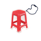 Red chair acrylic keychain with "Seated with Christ" design, from The Commandment Co, Singapore.