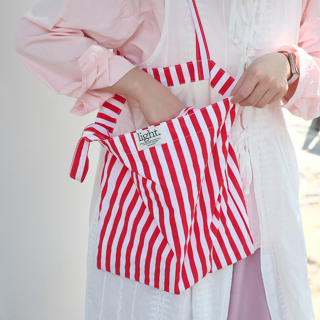 Red striped cotton tote bag designed for eco-friendly, reusable, and stylish daily use or grocery shopping