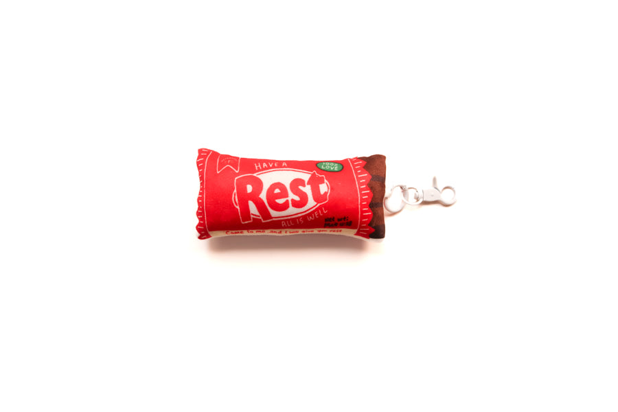 Rest Choco Bar plushie keychain with red chocolate bar-inspired design and clip.