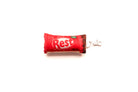 Rest Choco Bar plushie keychain with red chocolate bar-inspired design and clip.