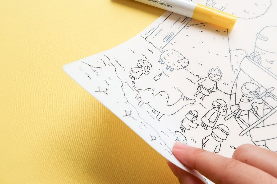 Reusable silicone Bible colouring mat shown as an easy-clean creative activity.