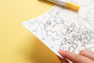 Reusable silicone Bible colouring mat shown as an easy-clean creative activity.