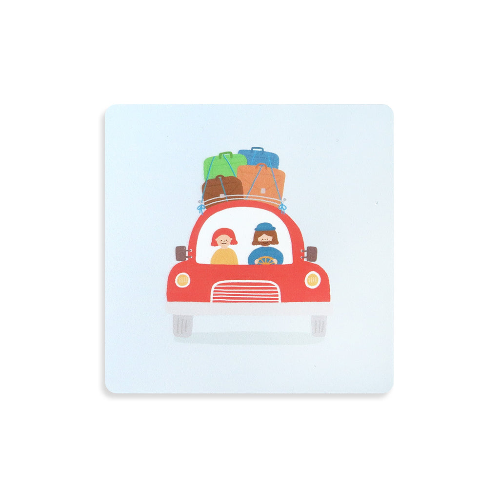 Road trip-themed Christian coaster featuring Jesus driving a red car with a child passenger and luggage on top, designed as a faith-inspired home decor item.