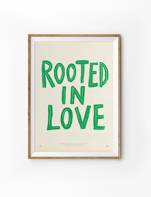 Rooted In Love Christian poster with bold green hand-drawn lettering on a warm neutral background