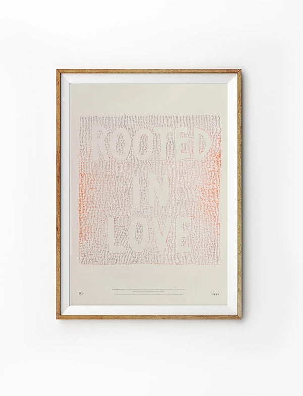 Rooted In Love Christian poster with soft coral textured lettering on a warm cream background